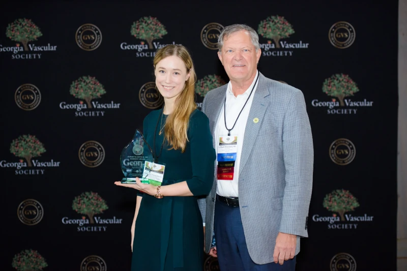 Katherine Owsiany, MD, PhD receiving award